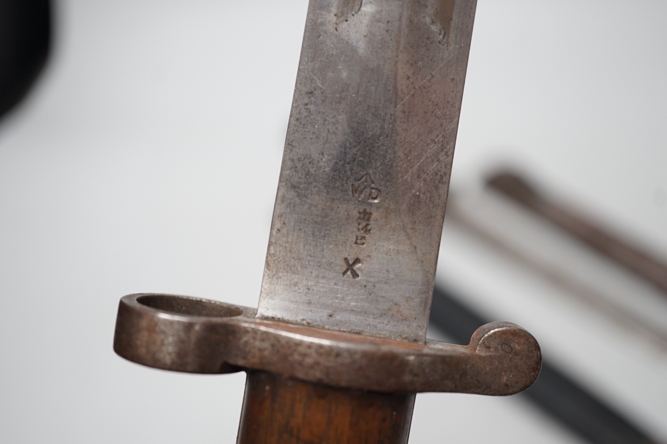 A 19th century British bayonet and scabbard together with a German bayonet and scabbard, the blade stamped Gottlieb Hammesfahr Solingen Foche